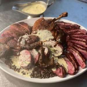 Bouchon Racine Assiette du Bouchon mkII, a magret, a confit leg, a mallard and sabode